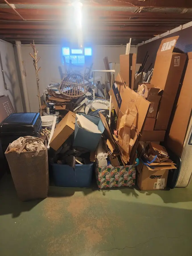 Roll-off dumpster container at job site for 4 Yard Dumpster Rental in Jackson